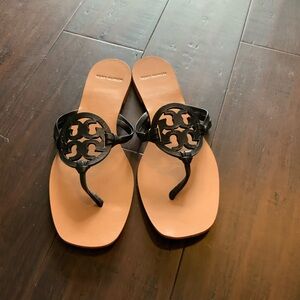 Tory Burch Black and Tan Sandals with Logo Emblem